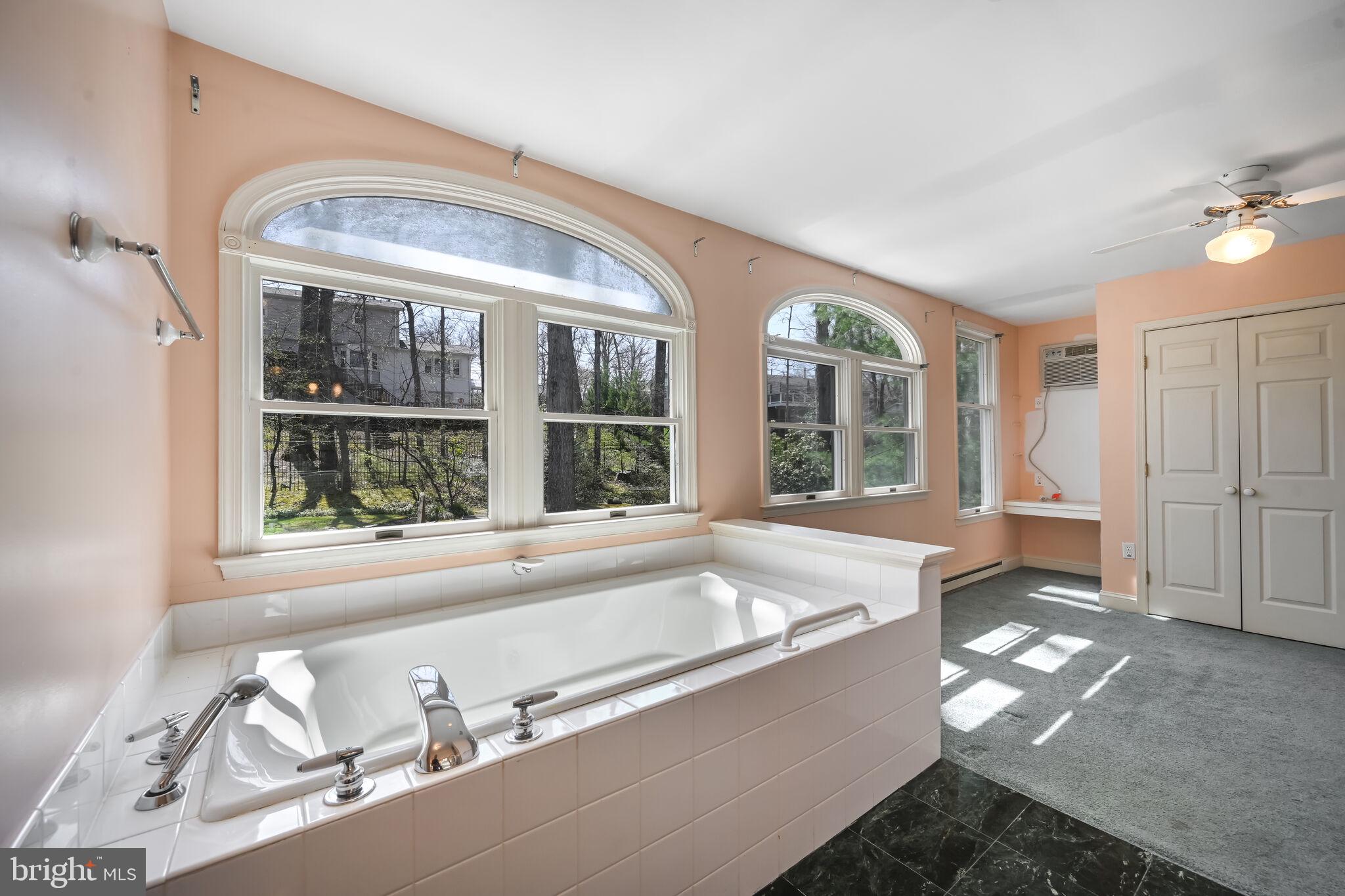 11337 Willowbrook Drive Rockville, MD 20854 - Photo 37 of 50 a living room with furniture and a large window