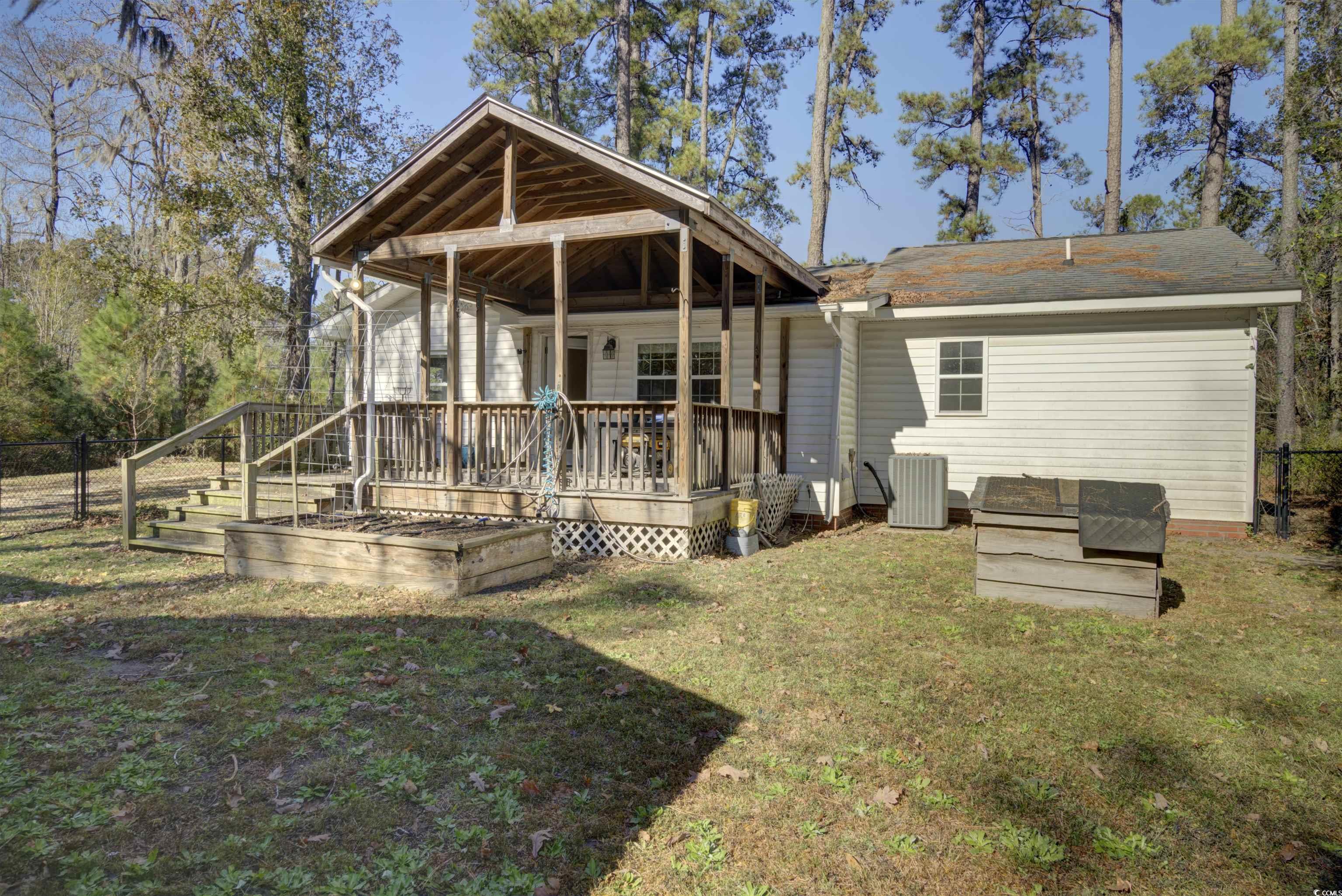 2080 Highway 90 Conway, SC 29526 - Photo 13 of 29 Rear view of property with a wooden deck