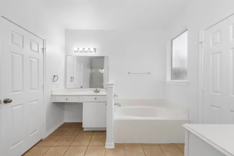 an empty room with mirror