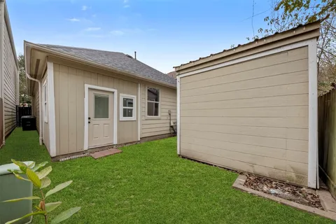 a view of a backyard with a garden