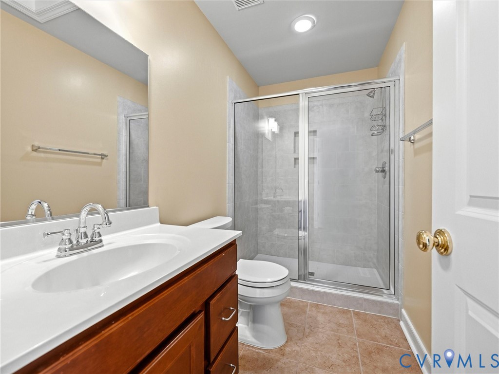 4428 Shirley Road Richmond, VA 23225 - Photo 64 of 70 There's a full bath and a walk-in closet.