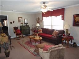 299 Knott Road Winchester, TN 37398 - Photo 5 of 20 Formal living room with ceiling fan.