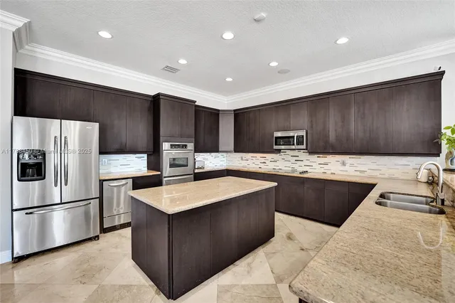 a living room with fireplace furniture and a flat screen tv