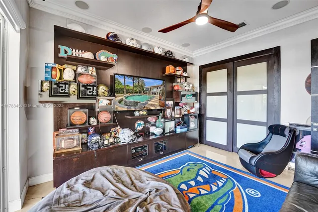 a spacious bedroom with a balcony a bed and a couch