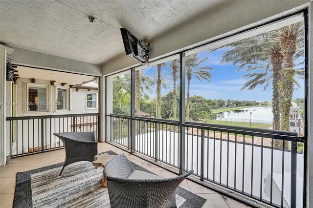 a front view of house with yard and trees