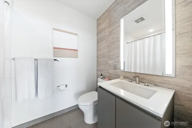a close up view of a washer and dryer in a utility room