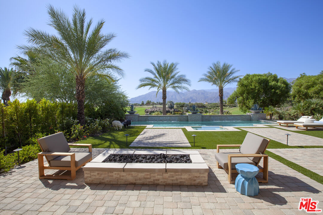 81805 Andalusia La Quinta, CA 92253 - Photo 20 of 45 a view of swimming pool with sitting area and garden