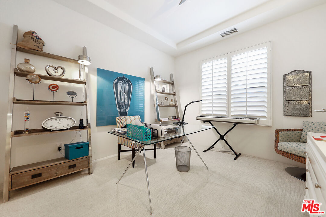81805 Andalusia La Quinta, CA 92253 - Photo 30 of 45 a view of a workspace with furniture