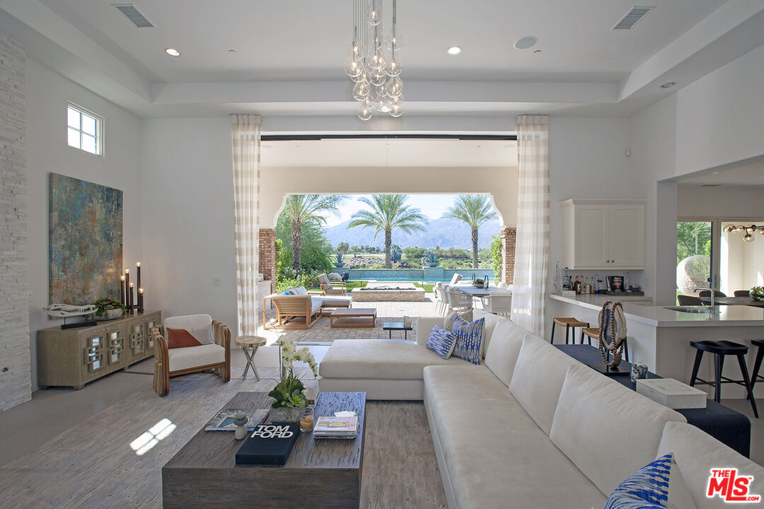 81805 Andalusia La Quinta, CA 92253 - Photo 44 of 45 a living room with furniture and a large window