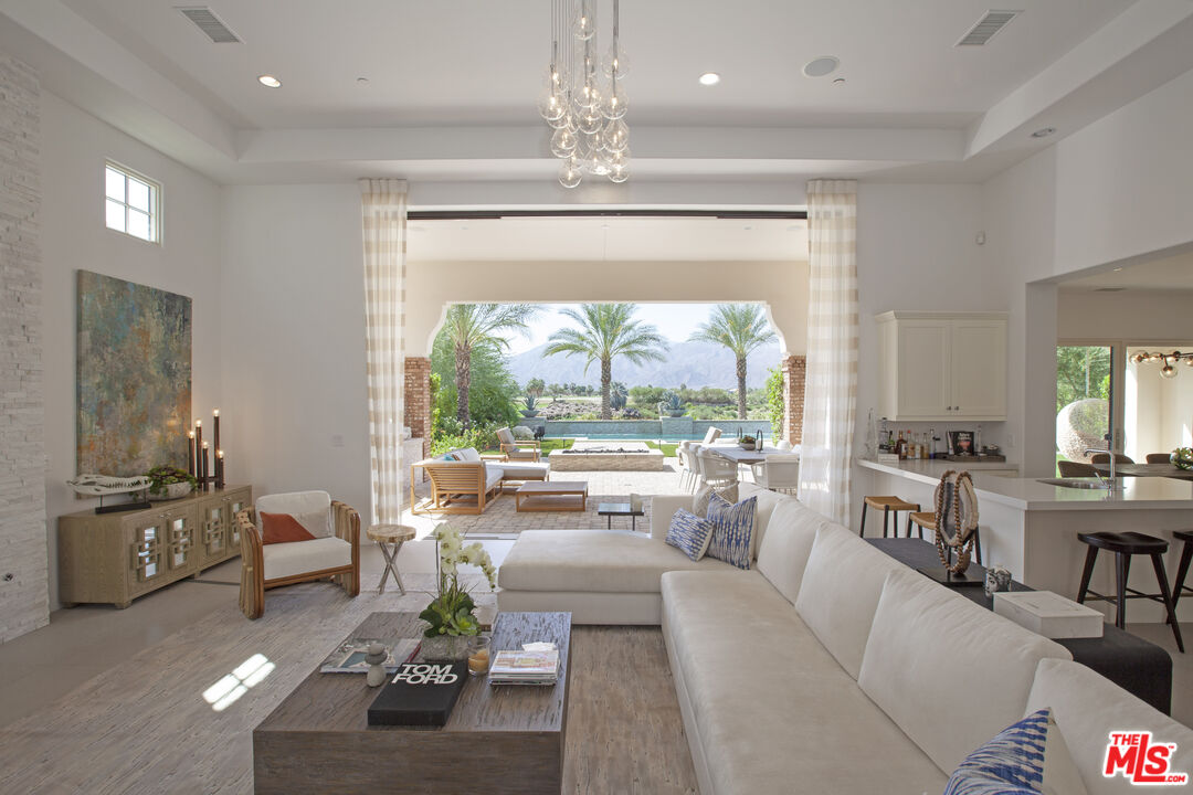 81805 Andalusia La Quinta, CA 92253 - Photo 8 of 45 a living room with furniture and a large window