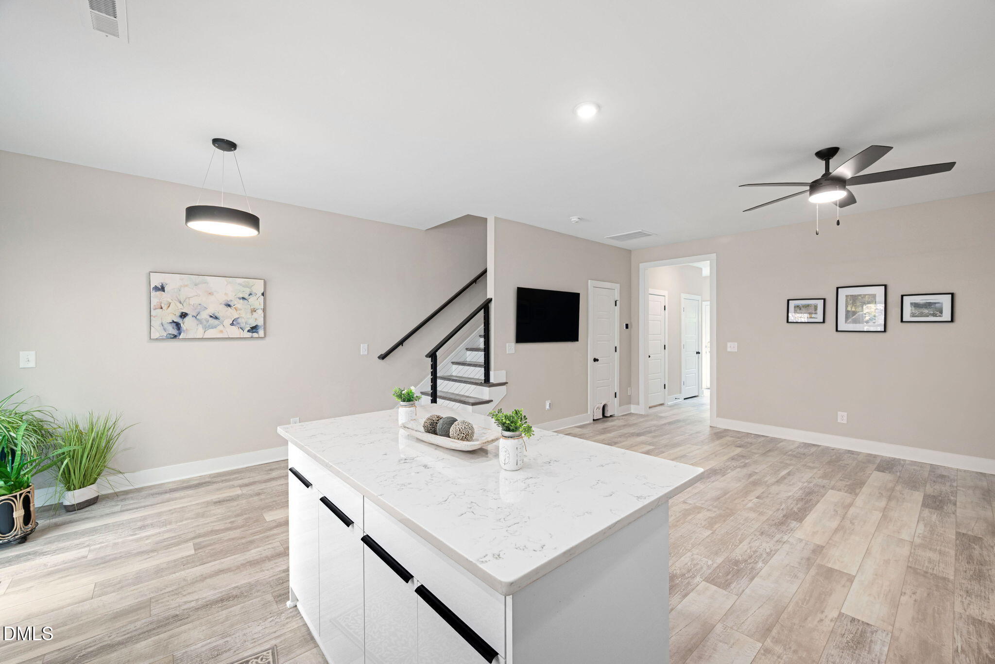 4208 Convergence Street Durham, NC 27704 - Photo 15 of 38 a living room with furniture and a flat screen tv