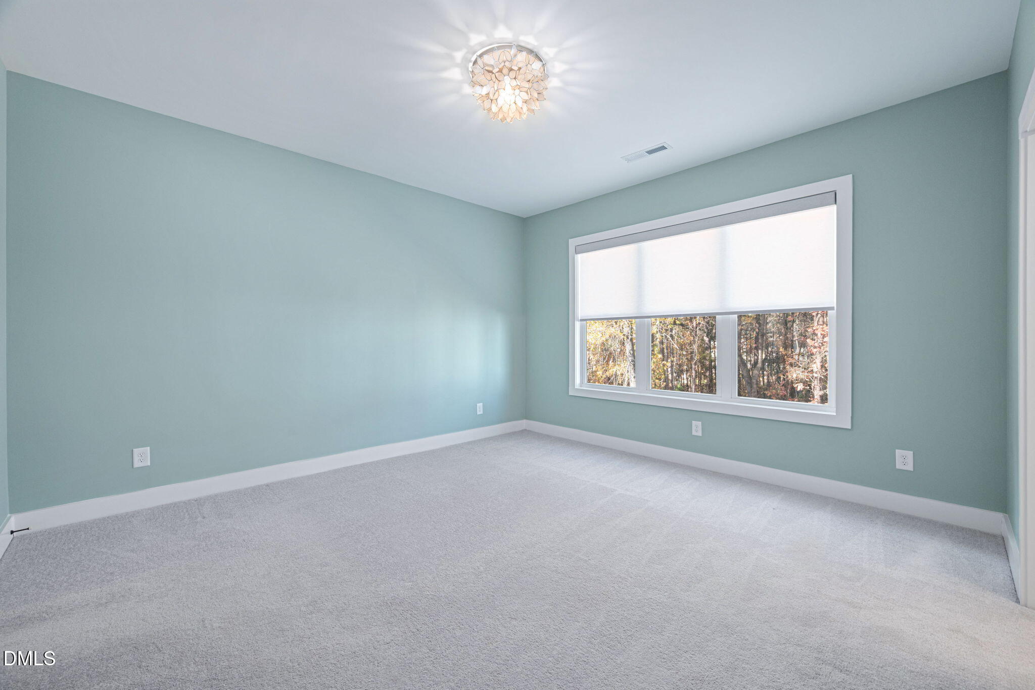 4208 Convergence Street Durham, NC 27704 - Photo 26 of 38 an empty room with a window