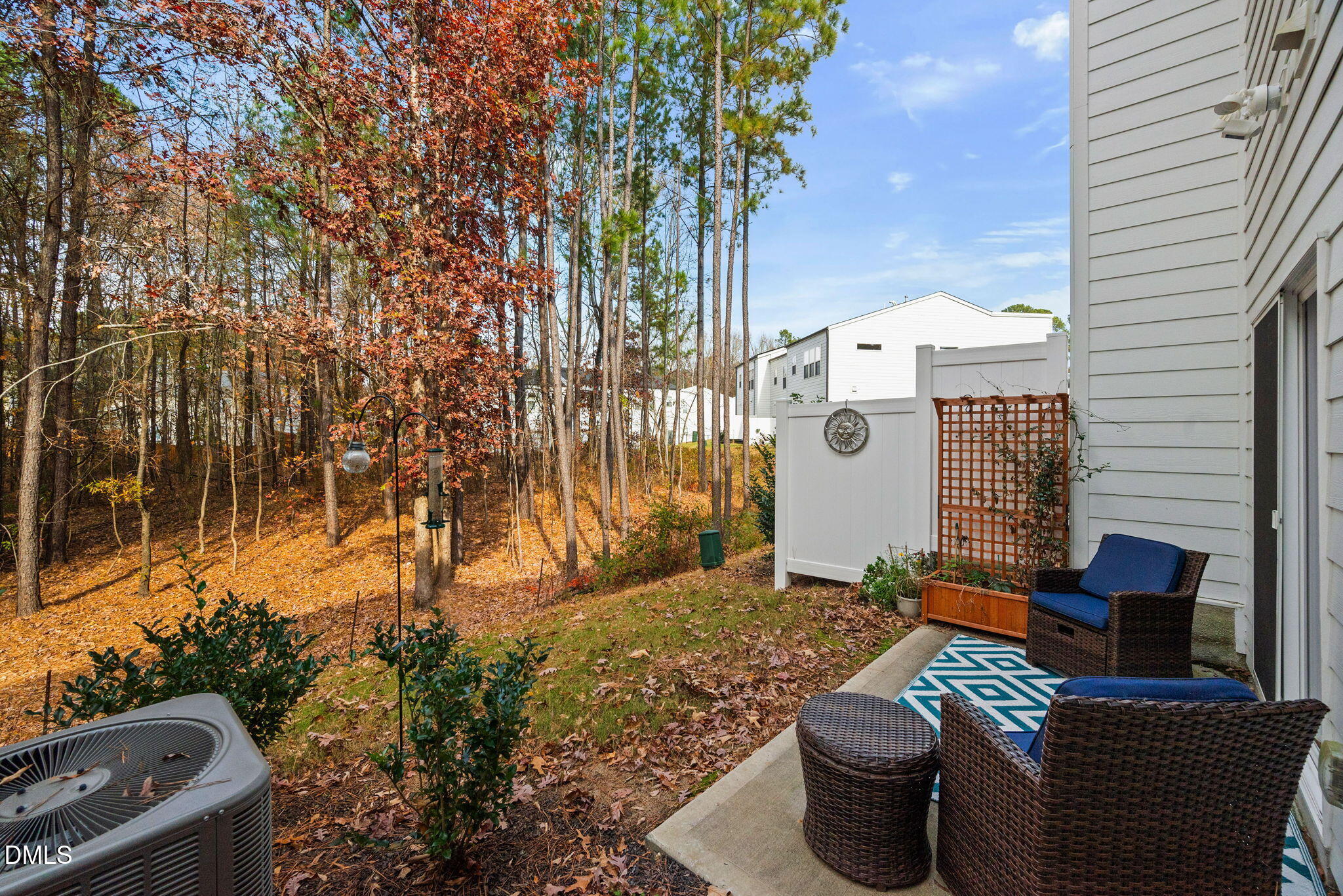 4208 Convergence Street Durham, NC 27704 - Photo 30 of 38 a view of a chairs and table in backyard