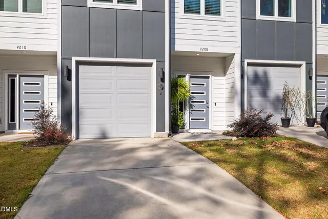 a view of yellow house with a outdoor space