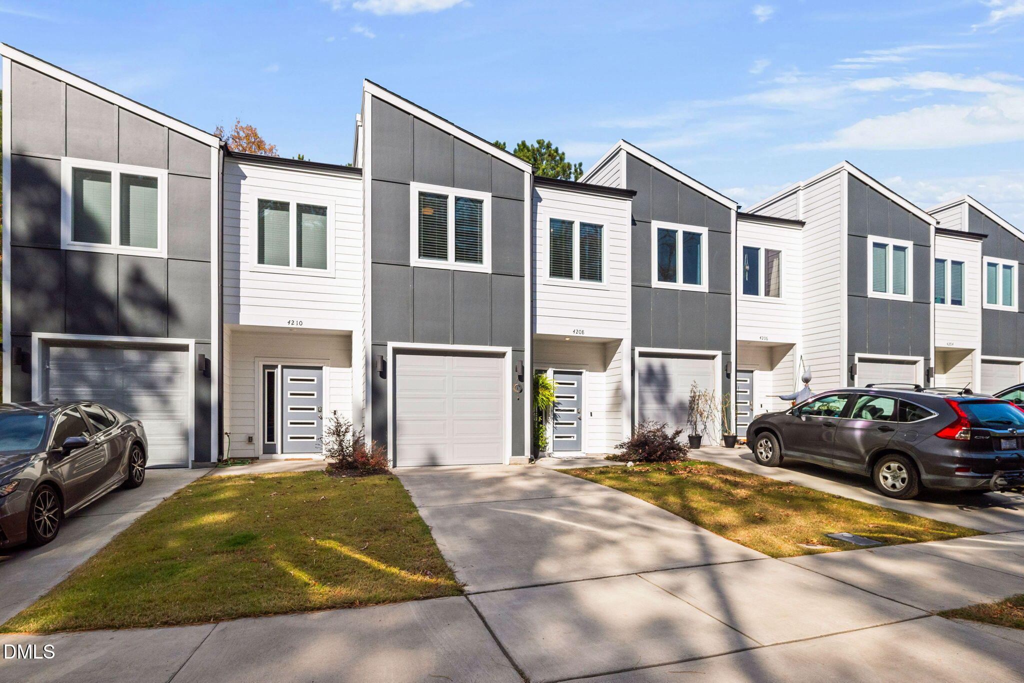 4208 Convergence Street Durham, NC 27704 - Photo 5 of 38 a view of a car park in front of a building