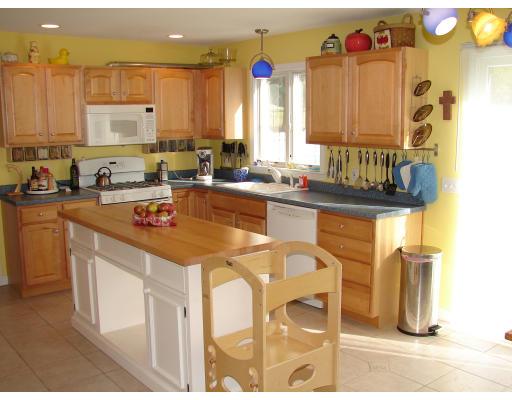 5 Tanglewood Drive Springfield, MA 01129 - Photo 4 of 19 a kitchen with stainless steel appliances granite countertop a sink and cabinets