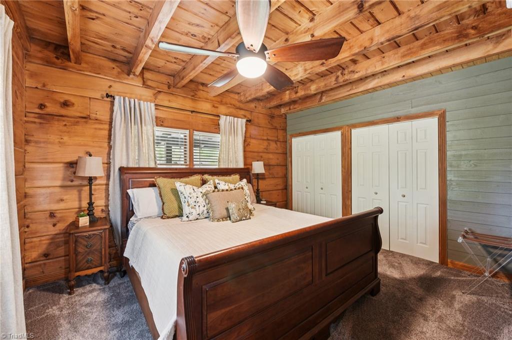 6875 Pisgah Covered Bridge Road Asheboro, NC 27205 - Photo 16 of 41 Primary bedroom with his and hers closets