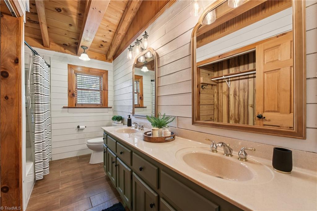 6875 Pisgah Covered Bridge Road Asheboro, NC 27205 - Photo 25 of 41 Upper level bathroom with dual vanities