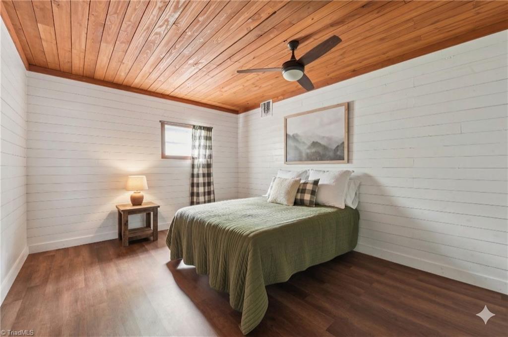 6875 Pisgah Covered Bridge Road Asheboro, NC 27205 - Photo 28 of 41 Unfinished room in the basement (not included in square footage). Virtually staged.