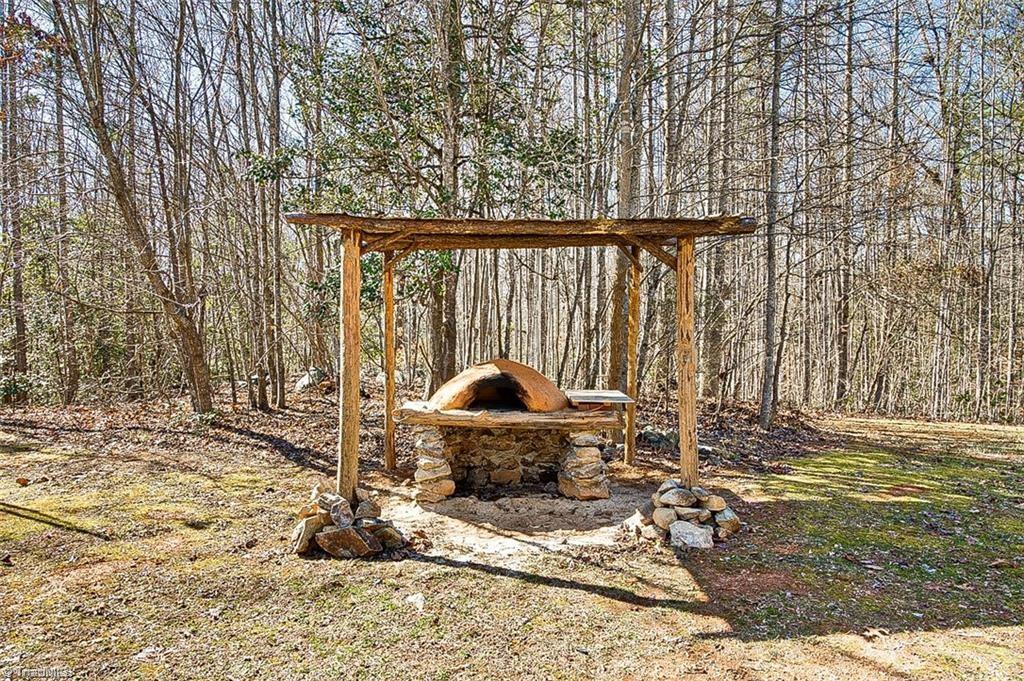 6875 Pisgah Covered Bridge Road Asheboro, NC 27205 - Photo 37 of 41 Wood fired oven