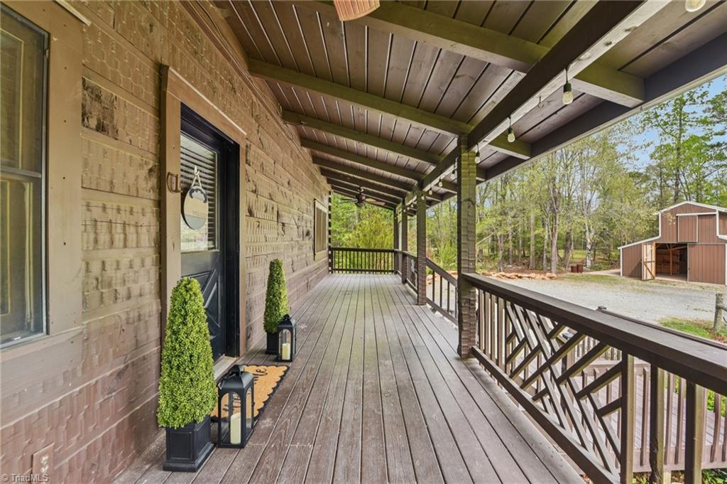 6875 Pisgah Covered Bridge Road Asheboro, NC 27205 - Photo 5 of 41 Rocking chair front porch