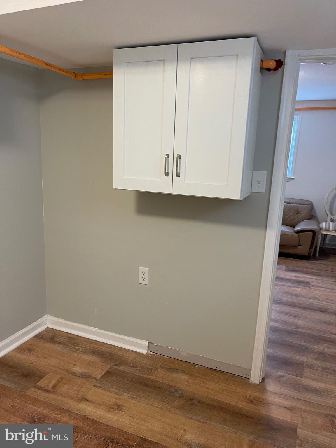 3207 # Road Beltsville, MD 20705 - Photo 12 of 25 a view of walk in closet with wooden floor