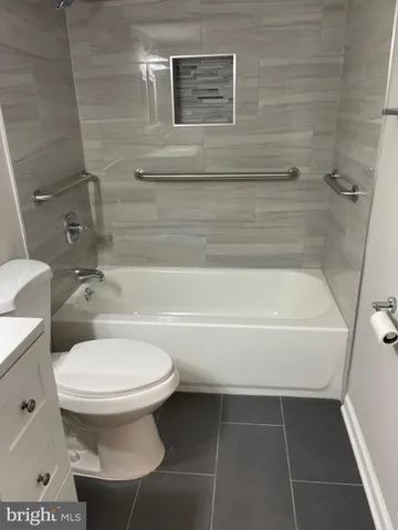 a utility room with washer and dryer