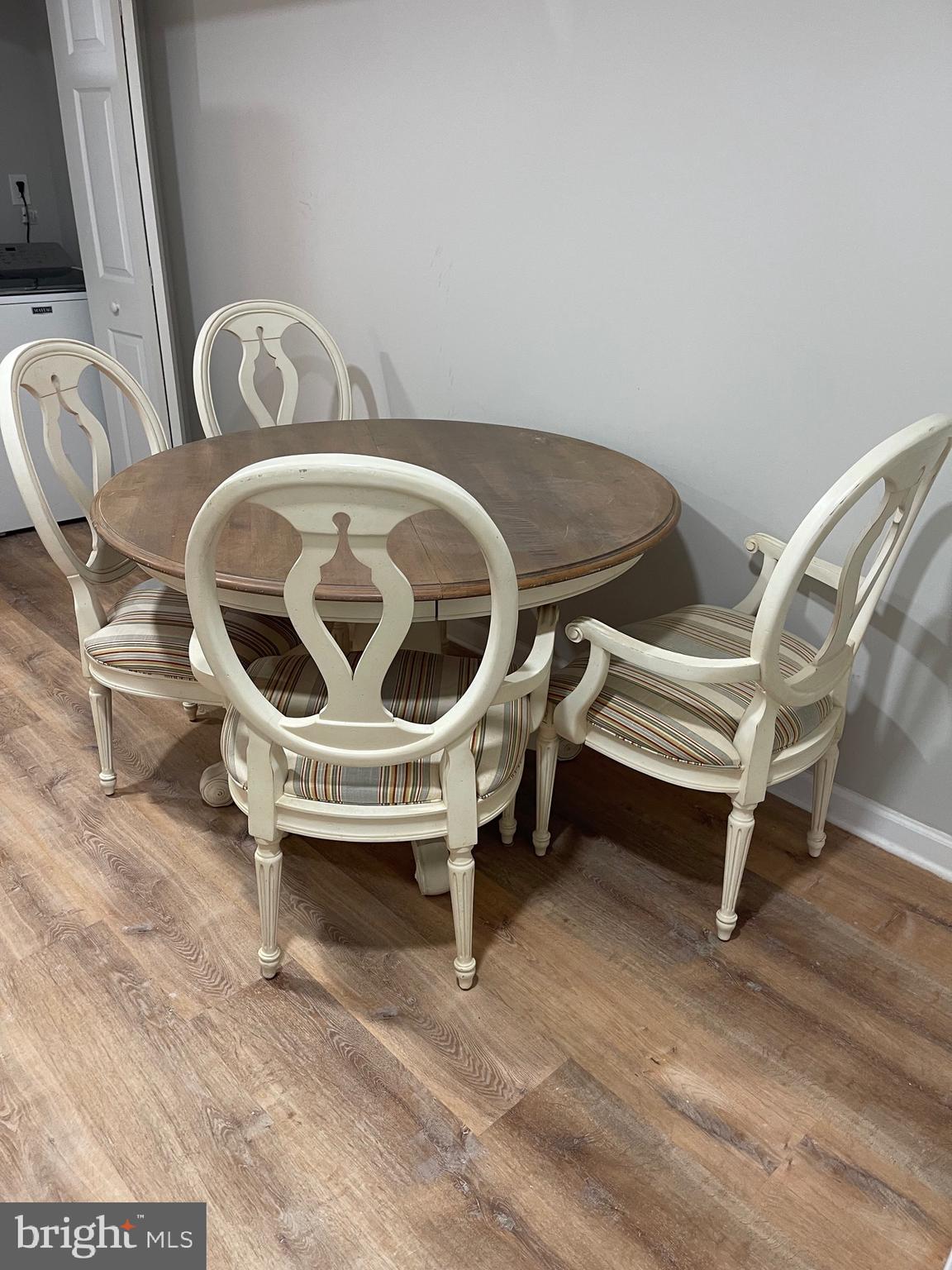 3207 # Road Beltsville, MD 20705 - Photo 20 of 25 a utility room with multiple dryer and washer