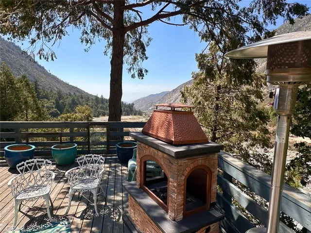 a kitchen with granite countertop wooden cabinets and a window