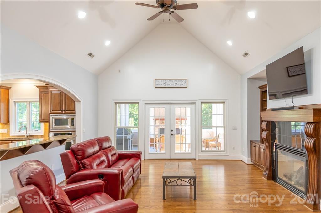 6723 Fox Ridge Circle Davidson, NC 28036 - Photo 3 of 42 a living room with furniture window and a flat screen tv