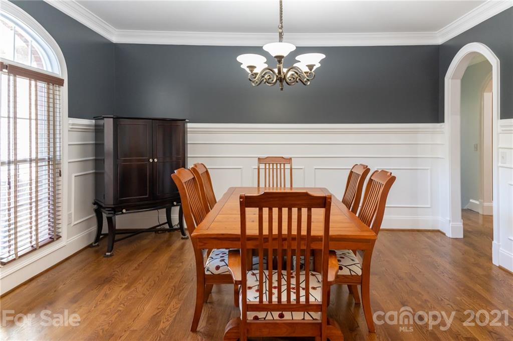 6723 Fox Ridge Circle Davidson, NC 28036 - Photo 8 of 42 a view of a dining room with furniture window and wooden floor