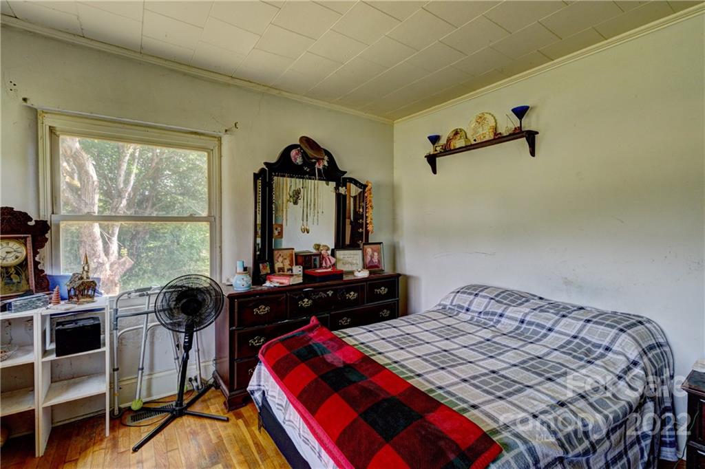 1119 Black Road Cherryville, NC 28021 - Photo 11 of 19 a bedroom with a bed and a window