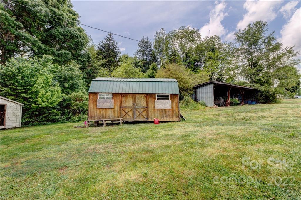 1119 Black Road Cherryville, NC 28021 - Photo 16 of 19 a view of a house with a yard