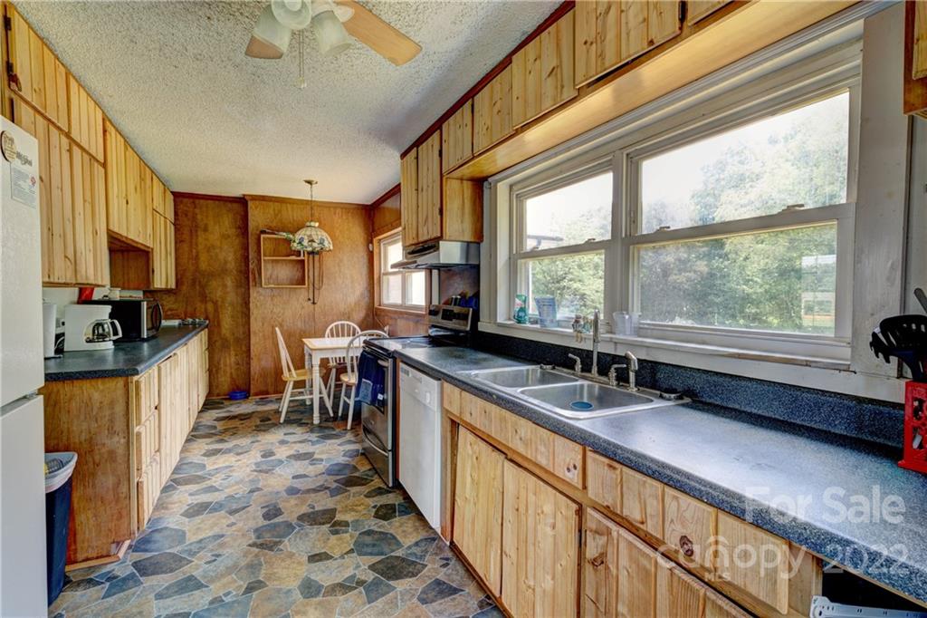 1119 Black Road Cherryville, NC 28021 - Photo 5 of 19 a kitchen with granite countertop lots of counter top space and stainless steel appliances