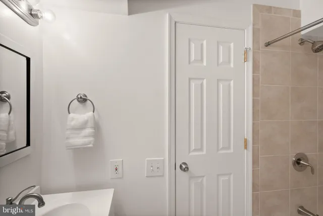 a bathroom with a white tub