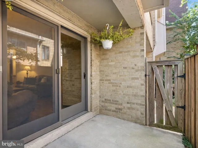 a view of a bathroom with a glass door shower and a mirror