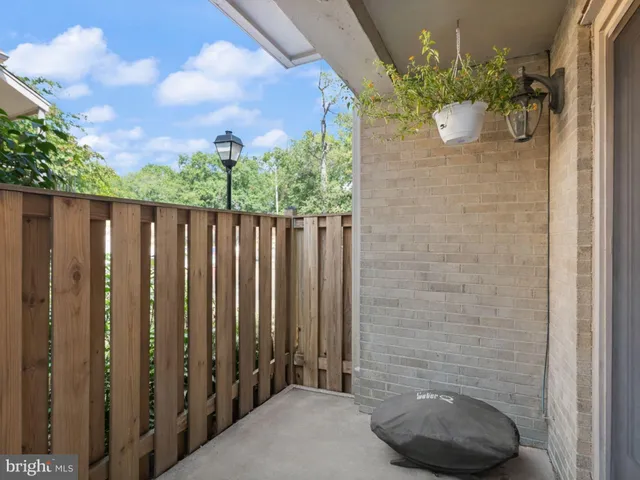 a view of a house with a potted plant