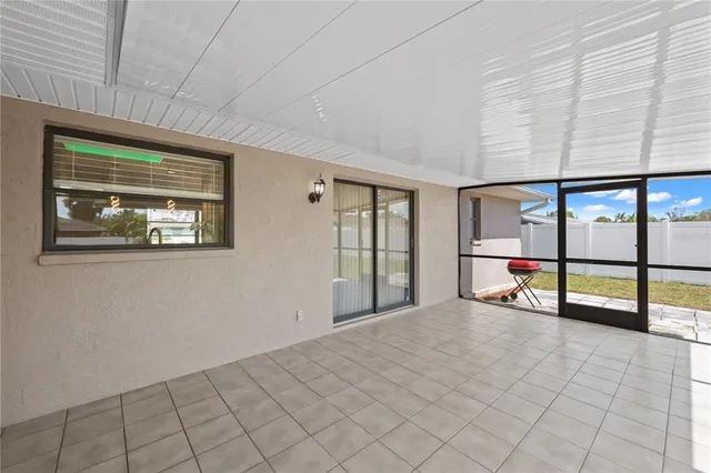 a view of an empty room with window