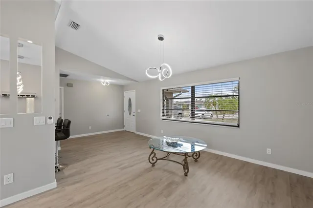a view of a livingroom with a workspace