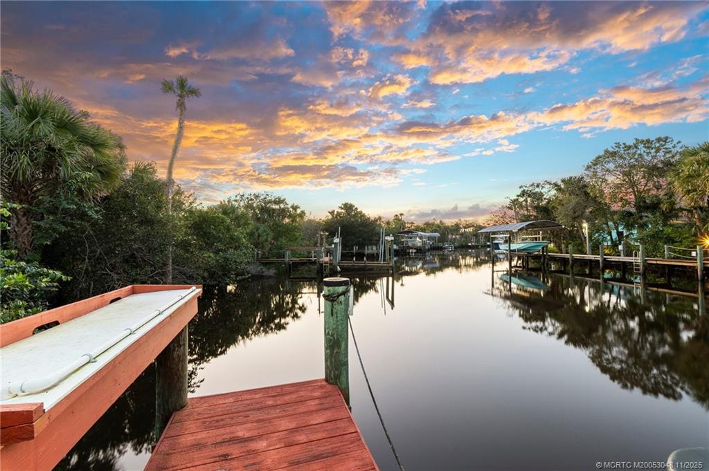 299 Southwest Lost River Road Stuart, FL 34997 - Photo 7 of 43 a view of lake and mountain