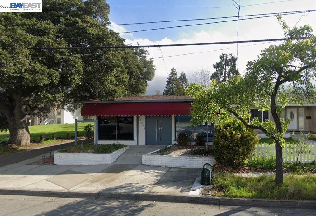 43342 Bryant Street Fremont, CA 94539 - Photo 8 of 10 a front view of a house with a yard