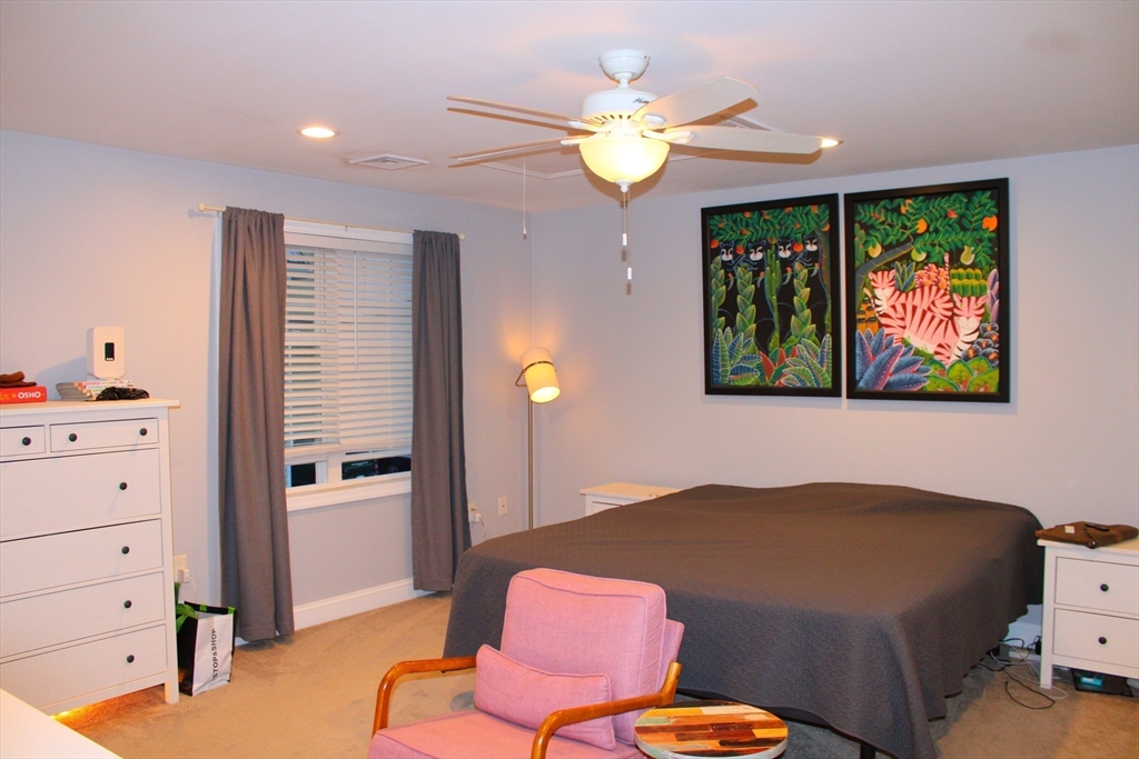 10 North Court Street, Unit 3 Fall River, MA 02720 - Photo 16 of 26 a bedroom with a bed and ceiling fan