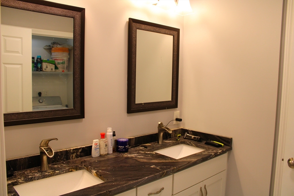 10 North Court Street, Unit 3 Fall River, MA 02720 - Photo 20 of 26 a bathroom with sink and mirror