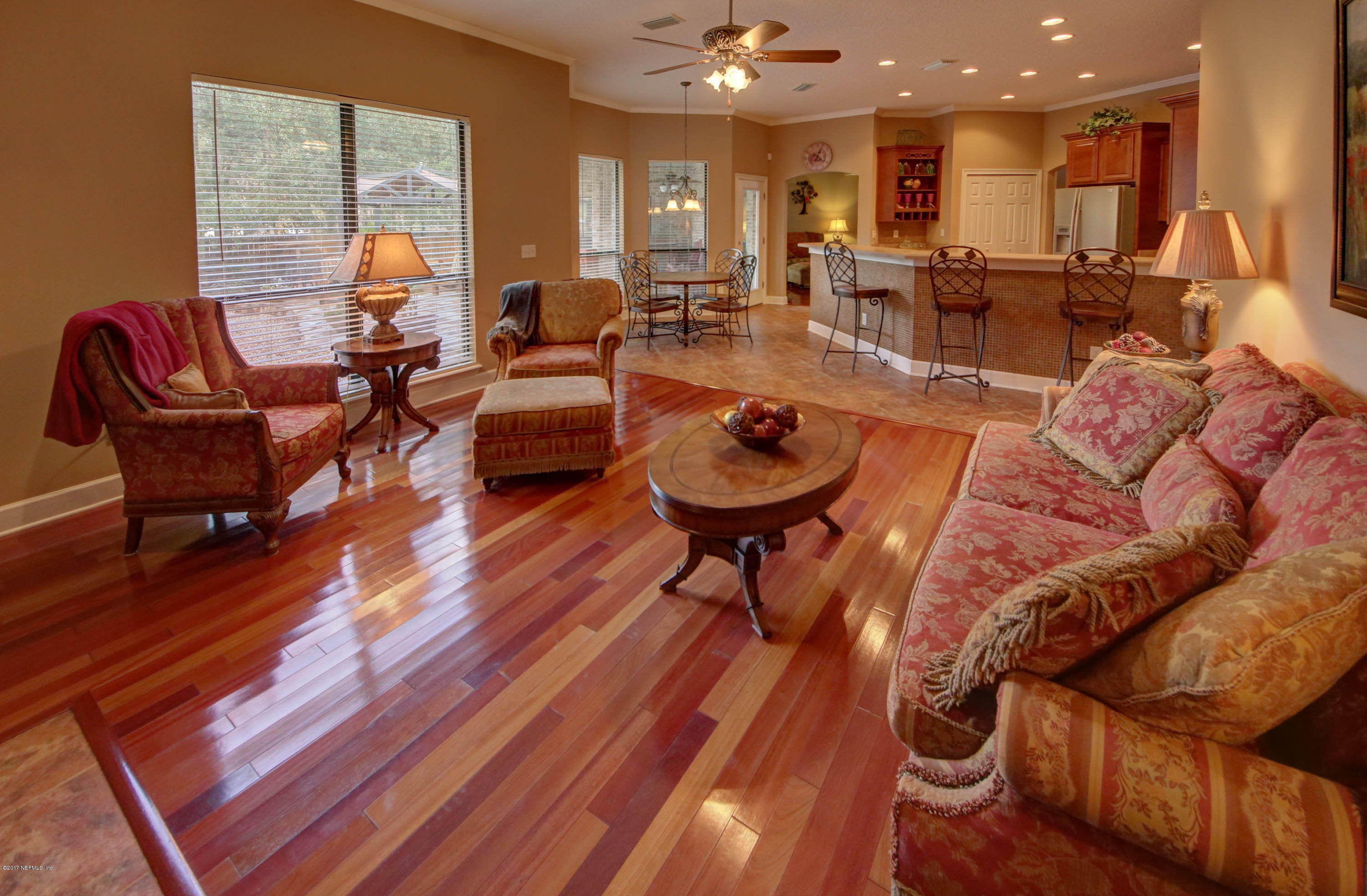 1302 Sinclair Lane Jacksonville, FL 32221 - Photo 11 of 32 a living room with furniture and a table