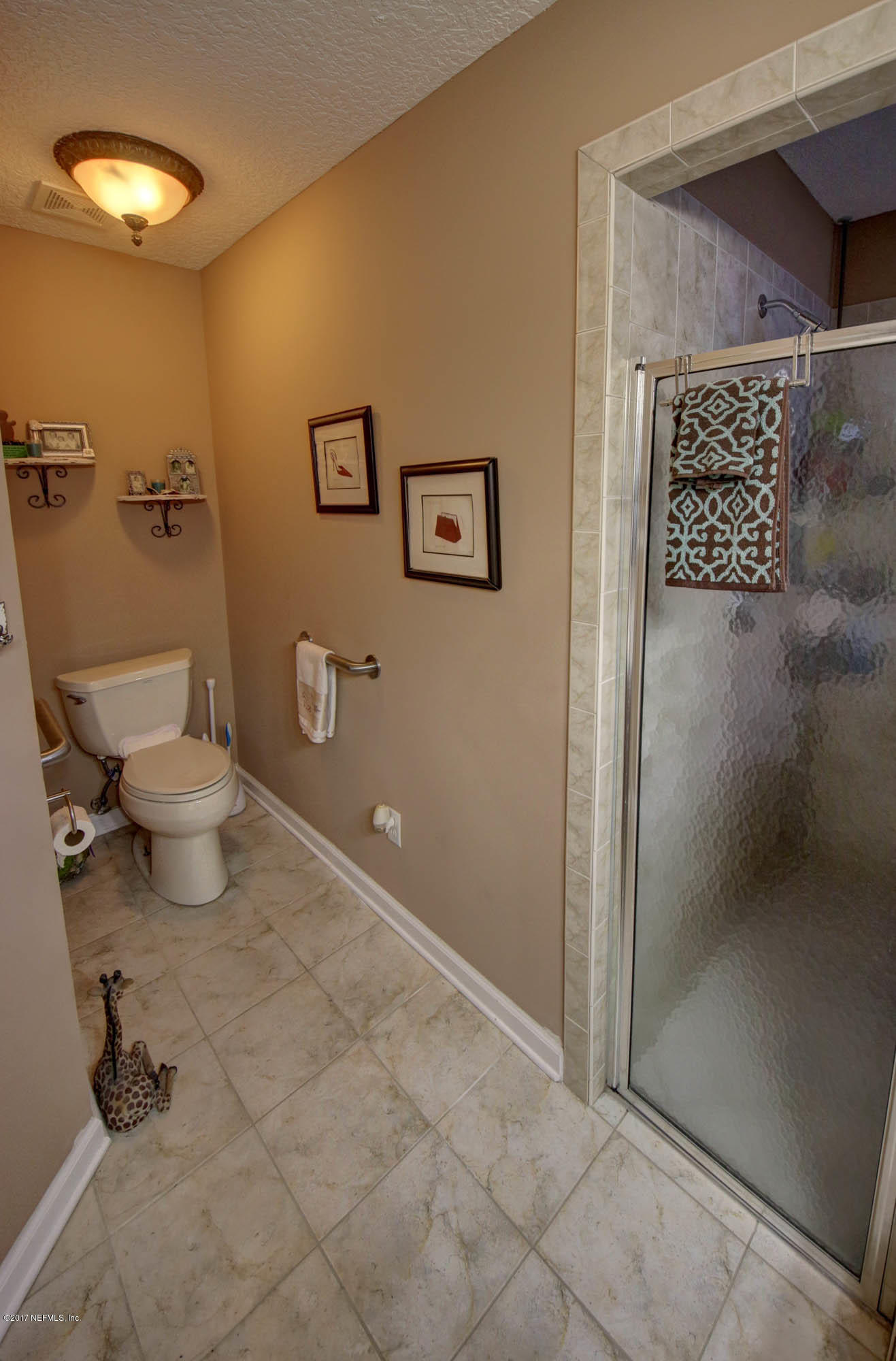 1302 Sinclair Lane Jacksonville, FL 32221 - Photo 22 of 32 a bathroom with a toilet