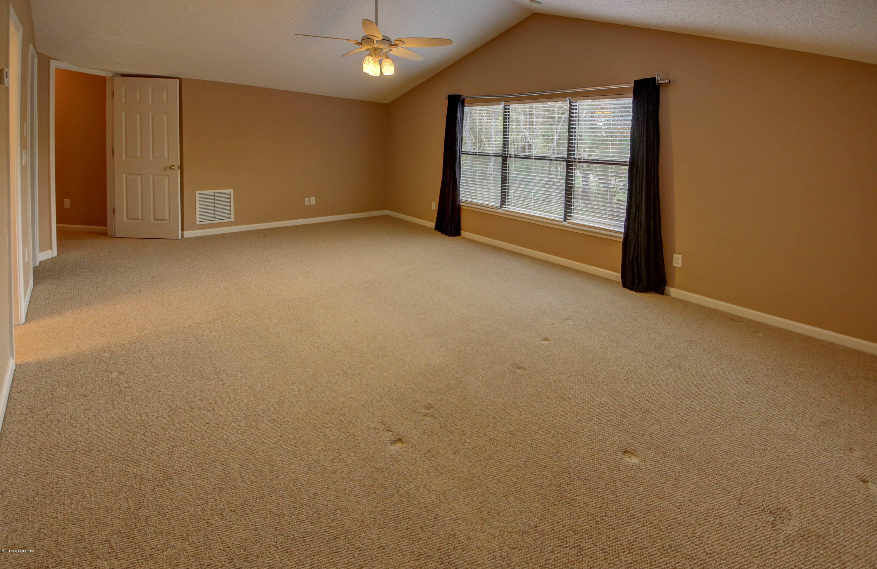 1302 Sinclair Lane Jacksonville, FL 32221 - Photo 24 of 32 an empty room with windows