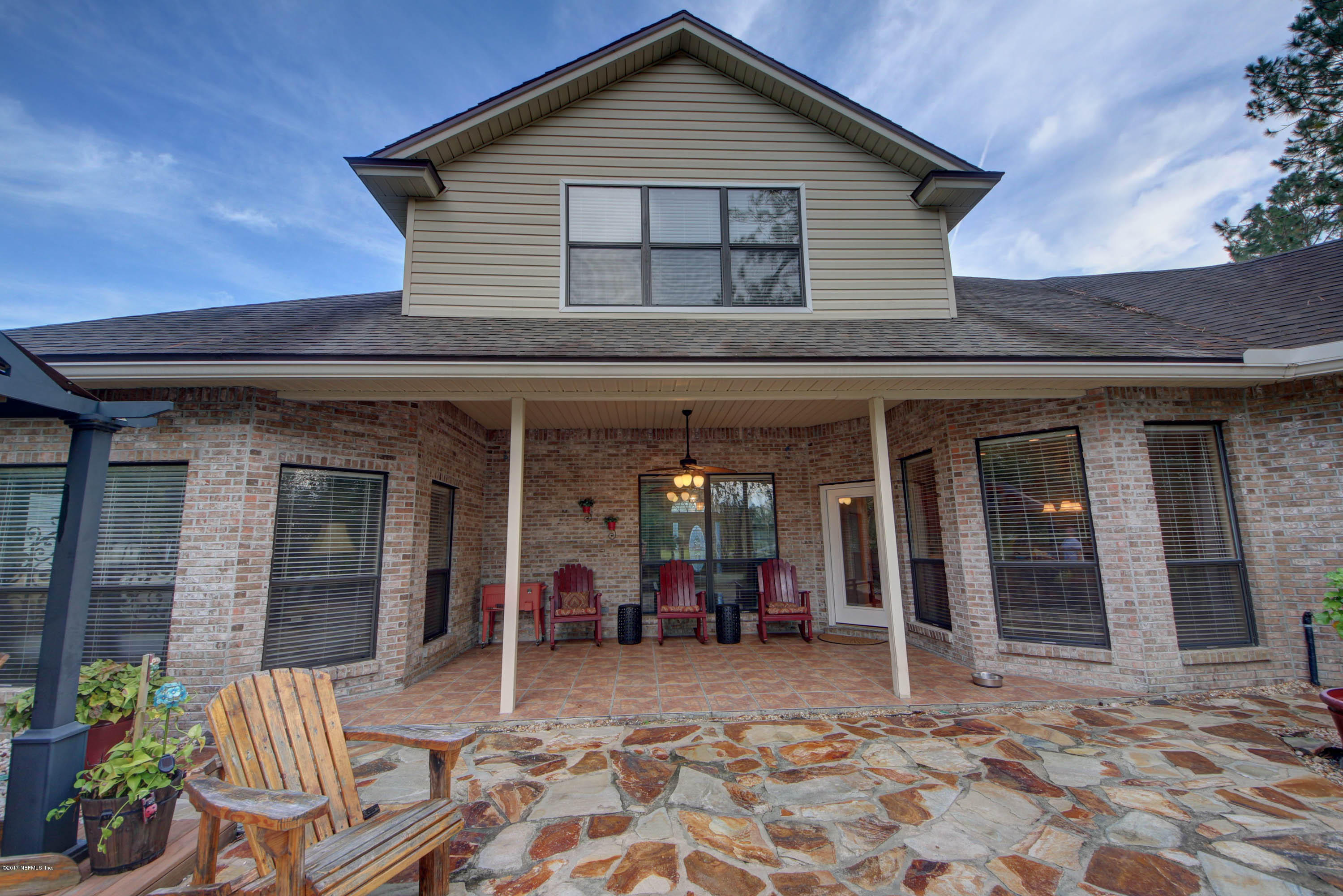 1302 Sinclair Lane Jacksonville, FL 32221 - Photo 32 of 32 a view of a house with a patio