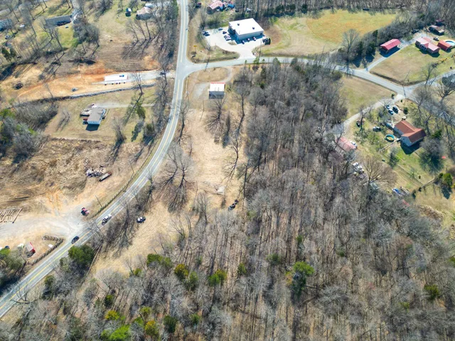 a backyard of a house with large trees