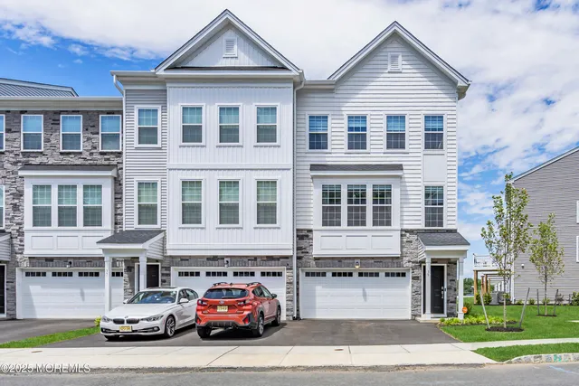 a car parked in front of a house