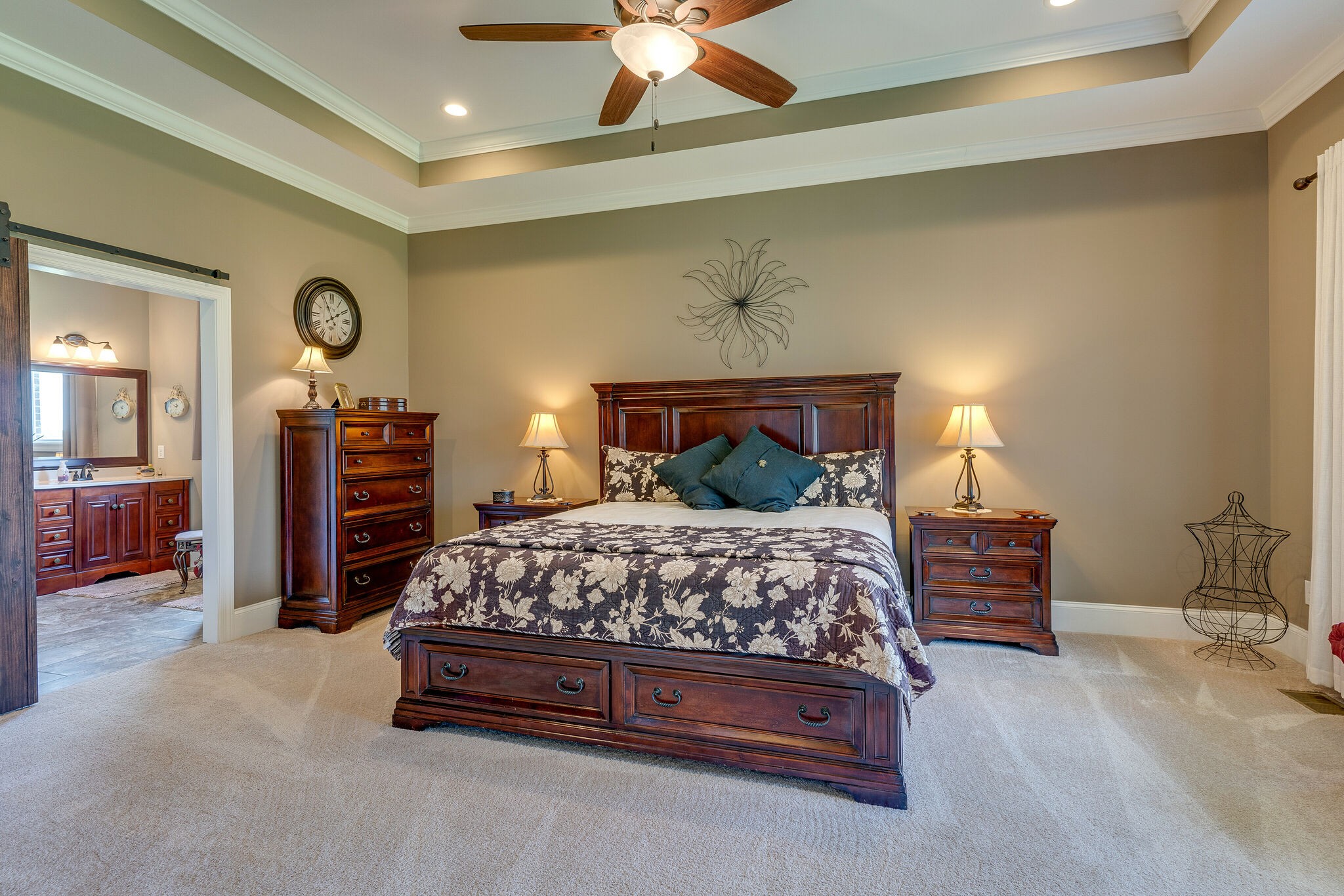 8882 New Chapel Road Springfield, TN 37172 - Photo 18 of 60 a bedroom with a bed and a chandelier